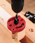 Pro Grade Drill Guide Locator With Vertical Self Centering Dowel Jig Kit and red aluminum body for precise drilling.