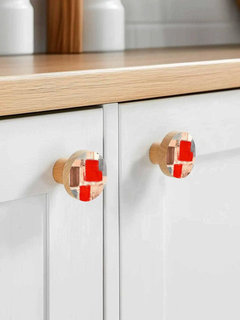 Gonna Level Up Your Cabinetry With These Knockout Beech Wood Cabinet Knobs Set Of Two 1.4 Inch Round Drawer Pulls Sporting Killer Red Painted Abstract Finish And Ridiculously Smooth Action on white kitchen drawers.