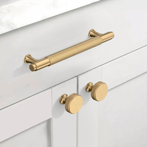 Premium Champagne Bronze Cabinet Knobs And Drawer Pulls Collection Featuring Swanky Knurl Texture And Rust Resistant Appeal For Stylish Home Projects Using Hella Sturdy Aluminum on white cabinet.