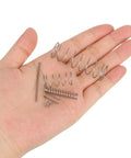 20-piece set of stainless steel compression springs in varying sizes (silver-tone), held in a hand.