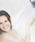 Woman enjoying shower with High Pressure Rain Shower Head With Five Settings And Durable ABS Plastic Body And Adjustable Swivel Ball Joint