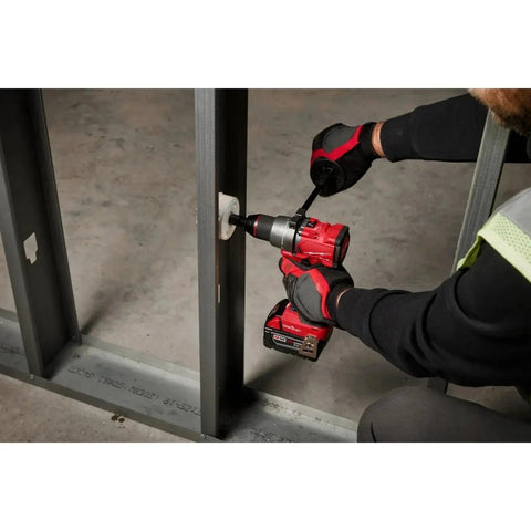 Get Off The Couch And Dive Into This Badass Brushless Cordless Compact Drill Driver Featuring A Rock Solid All Metal Gearcase Mechanical Clutch And Half Inch Carbide Chuck Built Tough As Nails Premium Bare Tool in use on metal framing.