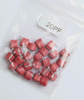 Awesome 45 Piece 6Mm Trimmer Capacitor Kit Featuring Nine Separate Values For Quick Radio Circuit Adjustments And Totally Hassle Free Weekend DIY Repair - red 20pF capacitors in a plastic bag.