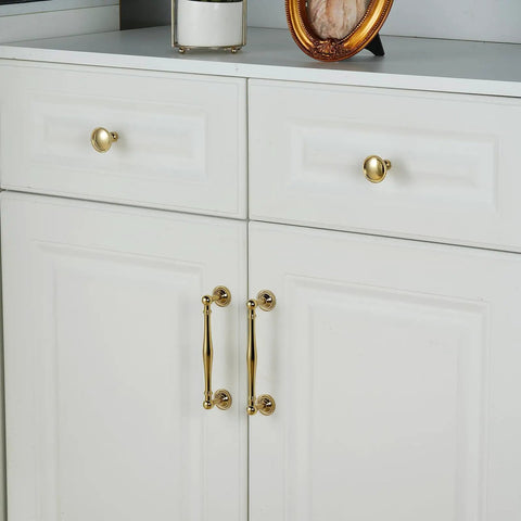 Premium Solid Brass Cabinet Pulls 5 Pack With 5 Inch Center Hole Gold Drawer Handles For Kitchen Cupboard Furniture And Bathroom Fixtures Bringing Sweet Kitchen Vibes And A Fly Classic Look on a white cabinet.
