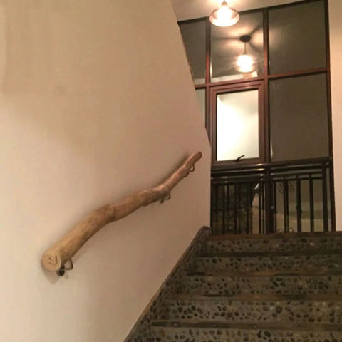 Built Like A Tank Adjustable Solid Wood Handrail Kit Tough Metal Brackets Nonslip Stair Railing along staircase wall.