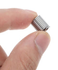 Close-up of a finger holding a stainless steel thread insert from the 10Pcs M8 Stainless Steel Thread Insert Kit For Quick Thread Repair And Maintenance