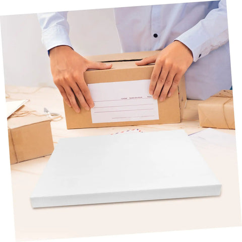High Density Pu Foam Sheets Two Pack For Kick Butt Packing And Shipping Cushioning on table beside customer packing box.