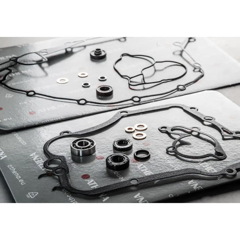 Premium Water Pump Gasket And Bearing Replacement Set with seals and bearings for KX 125 dirt bike maintenance.