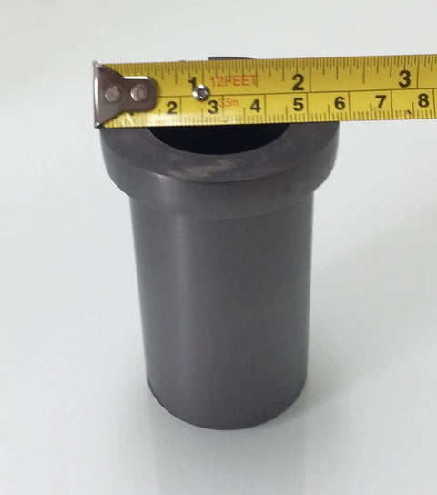 Authentic 99.9 Percent Pure Graphite Crucible Metal Melting Mold for Gold Silver and Brass Scrap casting, shown with measuring tape.