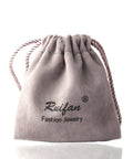 Ruifan suede pouch for jewelry storage, stylish gray drawstring bag for body jewelry accessories.