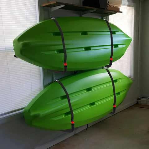 Big Time Heavy Duty 4 Pack Kayak Storage Racks Wall Mount Hangers for Canoe Paddleboard SUP and Snowboards holding two green kayaks securely mounted.