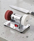 Sick Smooth Mini Bench Grinder Stainless Steel Electric Desktop Belt Sander With No Sweat Knife Sharpening And Fast Blade Restoration Slick Plug Play Garage Essential on counter