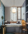 Large White Glass Globe Pendant Light With Plug In Cord Brushed Gold Ring Mid Century Modern Style in cozy living space