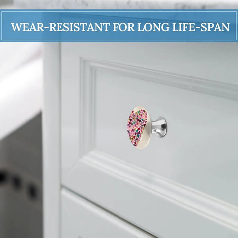 Hand Painted Heart Cabinet Knobs Two Pack Slick Round Drawer Pulls With Sturdy Stainless Steel Base and Mounting Hardware For Dresser Wardrobe Kitchen Furniture Knockout Glow Up on a white cabinet.
