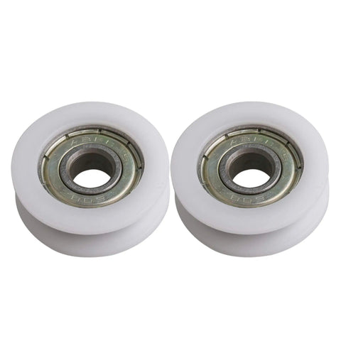 Set Of Four Heavy Duty U Groove Pom Pulleys With A Precision 8mm Bore And 30mm Outside Diameter, featuring smooth white rollers.