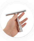 Top Shelf No Fuss T Bar Dent Puller Kit With Strong Adhesive Glue Tabs For Effortless Paintless Auto Body Repair And Quick Diy Dent Fixing On Cars Today, silver T-handle in hand.