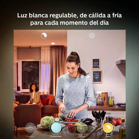 Woman cooking under Hue LightStrip Plus Dimmable LED Smart Light Extension for Ambient Mood Lighting, warm and cool tones
