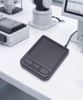 Industrial Panel Mount USB Touchpad With Mounting Ear, Wired Coiled Cable, Plug And Play Control Pad For Factory Automation And Heavy Duty Gear, Stable Precise Navigation And Easy Cable Management on lab bench