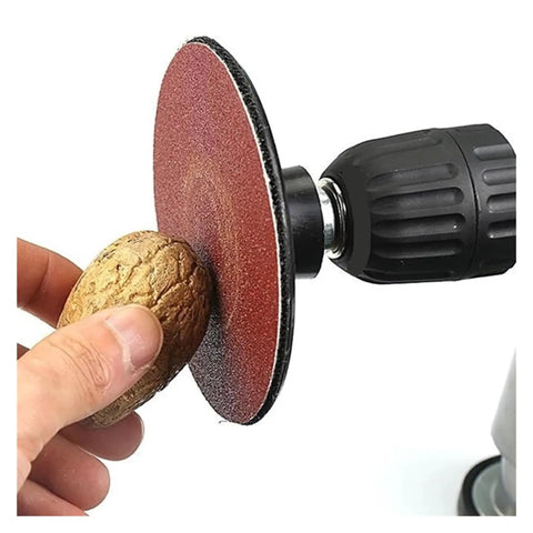 Premium Hook Loop Sanding Discs 25Pcs Assorted Grits Set For Wood Metal And Rust Removal, sanding a walnut with a drill.