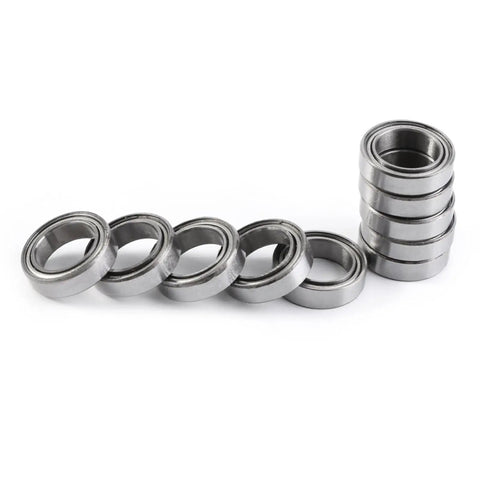 Smooth As Butter 10Pcs 10X15X4MM Double Shielded 6700ZZ Thin Bearings stacked and arranged for display, made of steel.