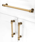 No Fuss Antique Brass Cabinet Pulls Ten Pack Five Inch Drawer Handles Heavy Duty Solid Metal Hardware With Smooth Rounded Edges on white cabinet.