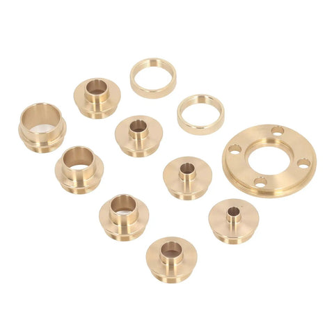 Hella Sturdy Brass Router Template Guide Set With Eleven Precision Bushings Ranging From Ten Mm To Thirty Mm Inner Diameter displayed.