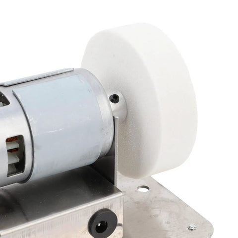 Close-up of motor and dual wheel on Powerful 100 Watt Mini Bench Grinder With Dual Wheels And Adjustable Speed For Smooth Wood Polishing And Steel Sharpening A Tight Little Workshop Essential.