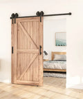 Heavy Duty Antique Black Bypass Sliding Barn Door Hardware Kit For Double Doors Top Mounted Steel Track with wooden door in room.