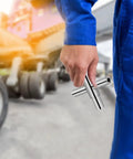 Heavy Duty Folding Socket Wrench Set Featuring Four Precision Cut Openings For Tight Squeezes And Faucet Repair Solid Steel Construction held by a worker.