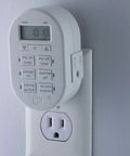 Plug And Play Digital Timer For Indoor Lights Lamps Small Appliances And Home Theater Easy Peasy Setup Saves Electricity mounted on wall socket.