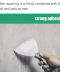 Hand using scraper with Fast Drying Wall Repair Paste With Scraper For All Surfaces Waterproof Crack Resistant Spackle on concrete wall.
