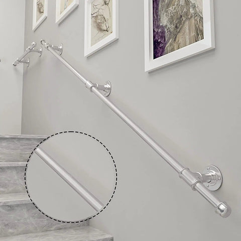 Solid As Hell Wrought Iron Handrail For Indoor And Outdoor Stairs Badass Grip Safety Banister With Galvanized Pipe Anti Rust Coating Zero Hassle Setup Kit For Home Or Business Projects 12 Feet Long installed along stairs.