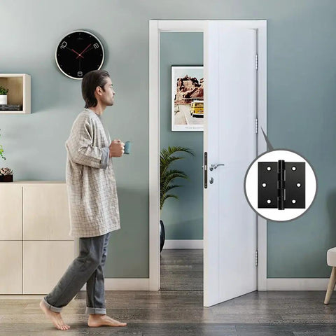 Top Shelf Black Three Point Five Inch Stainless Steel Door Hinges Built Tough Smooth Swinging Zero Fuss Setup Standard Fit For Interior Or Exterior Residential And Commercial Doors Four Pack on white door in modern interior.