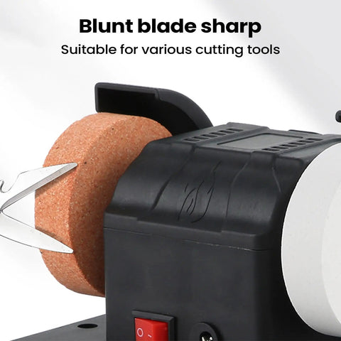 Close-up of Workhorse Dual Wheel Electric Knife Sharpener And Polisher with cutting tool on grinding plate for blade sharpening.