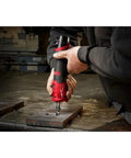 Pro Grade Brushless Straight Die Grinder With Variable Speed Gears and Quarter Inch Hex Shank used for precision grinding on metal surface.