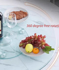 Glass Lazy Susan Turntable For Kitchen And Dining Table Featuring A Smooth Operator Spin with fruit and wine on a marble table