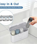 Travel Bottle Set With Case Four 2oz TSA Approved Containers Leak Proof Design Press To Unlock shown with hand holding bottle.