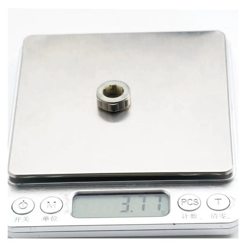 Heavy Duty One Way Clutch Needle Roller Bearing 5 Pack For Compact Mechanical Builds displayed on a scale showing weight.