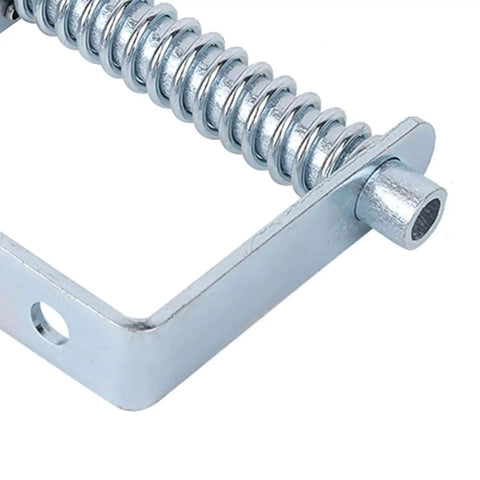 Heavy Duty Spring Loaded Gate Caster With Butter Smooth 360 Swivel Fence Hubs And Shock Resistant Treads close-up of spring mechanism.
