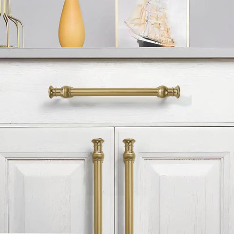 Ten Pack Six Inch Brushed Brass Cabinet Pulls featuring heavy duty solid metal construction on white cabinet.