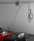 EV Charger Cable Retractor Ceiling Mount Tangle Free Cord Organizer Ditch The Cord Chaos For A Slick Garage Setup Smart Auto Return, showing installation above two cars.