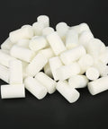 Pile of white fiber cotton filters, part of Nebulizer Filter Replacements 50 Pack for Nebulizer Accessories and Air Compressor Pumps for 30 MPa Machines.