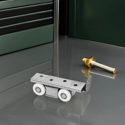 Four Wheel Stainless Steel Sliding Door Hardware Kit Provides Whisper Silent Action And Smooth Gliding Performance Perfect For Wardrobes And Kitchens With Rust Proof Construction That Handles Humid Conditions Like A Champ While Keeping Doors Running. Close-up of stainless steel sliding door roller with nylon wheels.