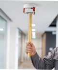 Slick Aluminum Alloy Ceiling Smoke Detector Puller With Heavy Duty Claw Head lifting smoke detector with a golden aluminum pole.