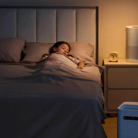 Child sleeping peacefully in bed with soft lighting, featuring Top Shelf Dimmer Light Switch 6 Pack White single pole setup.