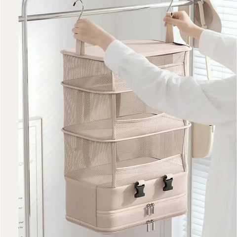 Heavy Duty Hanging Travel Shelf Bag Organizer For Luggage Suitcase With Ventilated Mesh Pockets And Water Repellent Nylon Fabric showing compact design.