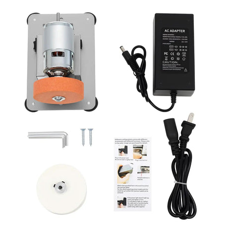 No Nonsense Mini Bench Grinder Rockin A Beefy 96W Copper Motor with components including an AC adapter and grinding wheel.