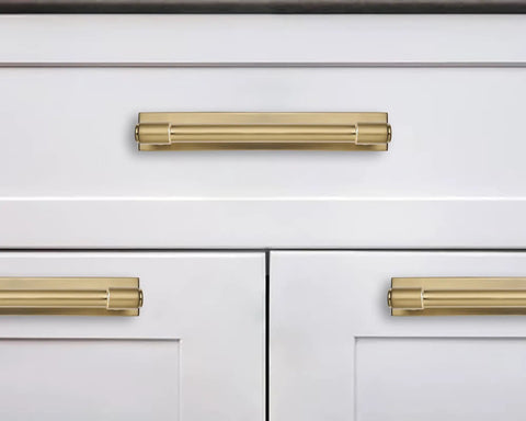 Straight Up Heavy Duty 6 Inch Cabinet Pulls With Slick Brushed Gold Finish And Solid Brass Base Plate For Kitchen Drawers on white cabinets.
