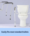 Foldable Bathroom Safety Rail With Adjustable Arms And Universal Seat Fit Rock Solid Aluminum Frame beside a standard toilet.