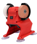 Tough As Nails 18V Cordless Mini Bench Grinder And Polisher Kit showing dual corundum wheels and red base with suction cups.